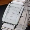 Reloj para Pareja al por Mayor Reloj Dawn Punto Cuadrado Reloj de Cuarzo 104A Reloj para Mujer Hombre Fabricantes de Relojes