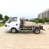 El Camión de Basura de Brazo de Gancho Cuadrado Dongfeng Se Puede Usar para Recolectar y Transportar Basura Doméstica en Áreas Residenciales, Lugares Turísticos y Zonas Rurales. Un Camión Puede Llevar Múltiples Cajas