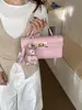 Bolsa Quadrada Pequena Fashion com Fivela de Travamento, Nova Bolsa de Mão, Bolsa Kelly Simples e Elegante, Bolsa de Mão e Bolsa Transversal de Nicho de Alta Qualidade