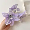 Super Fada Tridimensional Linda Flor de Lírio Presilha Feminina Alto Nível 2025 Nova Flor de Cabeça Presilha Tubarão Disco de Flor para Cabelo Adorno de Cabeça