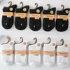 Calcetines nuevos de doble aguja para dama color sólido casual de algodón calcetines de otoño e invierno gruesos cálidos algodón peinado calcetines de mujer al por mayor