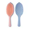 Forma de hoja sin nudos y pelo TT peine de masaje alto valor de color portátil peluquería hombres y mujeres peine de cojín de aire parte superior craneal esponjosa