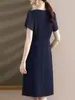 Vestido de verano a la moda para madres, vestido de cuello redondo y manga corta, vestido irregular de longitud media elegante y con estilo para mujeres de mediana edad de 50 años