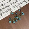 Pendientes Colgantes Redondos de Piedra Estilo Étnico con Borlas, Lujo Ligero y Sensación de Alta Gama, Pendientes Personalizados Estilo Chino Nuevo al por Mayor para Mujeres