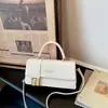 Bolso pequeño cuadrado tejido de color liso estilo europeo y americano con asa corta, tapa abatible y diseño de cierre, versátil para uso diario, bolso de mujer de un solo hombro o cruzado