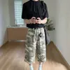 Venta al por mayor de fabricante jeans cortos camuflados de estilo urbano americano para hombre, pantalones cargo rotos, shorts holgados de pierna ancha para hombres y mujeres
