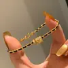 Anillo de Correr Dorado de Moda Pulsera de Oro Negro para Mujer Cadena Sencilla de Moda Estilo Chanel Pulsera Tejida Cepillada Brillante