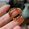 Anel Tecido de Pedra Olho de Tigre Incrivelmente Bonito para Atrair Riqueza Feminina, Design de Nicho Vintage, Anel Exquisito e de Alto Padrão para o Dedo Indicador