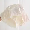 Ropa interior de algodón para mujer Clase A 10A antibacteriana de seda de morera con entrepierna extendida, bragas triangulares de algodón puro con borde de volantes de color liso para niñas y estudiantes
