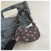 Bolso de axila artístico de nicho estilo coreano con forma de estrella para mujer, nuevo modelo 2026, bolso de hombro único plisado para el día a día con un toque de alta gama y diseño versátil