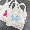 Bolsa de punto nueva para viajes de primavera y verano, bolsa de hombro con patrón de nicho de tortuga, bolsa tejida hueca para mujer de vacaciones en la playa del mar
