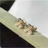 Fanjia Oro de 18 Quilates Color Chapado Pétalos de Trébol Llenos de Diamantes Cadena para Clavícula de Trébol Colgante de Flor Única Anillo de Nicho de Flor