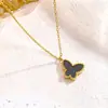 Popular Set de Pendientes Doble Cara de Mariposa con Acabado Dorado, Diseño de Nicho, Acero de Titanio Nácar, Collar y Pulsera de Alta Gama Transfronteriza 18K