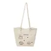 Bolsa de Praia para Férias na Beira-Mar Feminina 2025 Nova de Verão Bolsa de Ombro Trançada Grande Capacidade Bolsa Tote de Palha de Axila