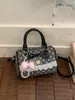 Bolsa de ombro fofa estilo coreano, estilo faculdade, nova mochila pequena de verão 2026 para o dia a dia, bolsa de mão portátil de nicho com bolinhas