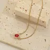 Collar con colgante de rubí vintage estilo francés para mujer, cadena para la clavícula de acero de titanio con doce piedras estelares, joyería al por mayor