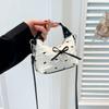 Bolso de Mano Mini Compacto para Mujer 2026 Nuevo Nicho Gama Alta Lazo Nudo Bolso Dumpling Hombro Único Cruzado