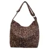 Bolsa de lona com estampa de leopardo, estilo coreano, nicho, nova coleção outono/inverno, estilo casual e descontraído, bolsa de ombro de grande capacidade, adequada para o dia a dia