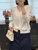 Cárdigan de encaje estilo coreano de lujo ligero, con relieve 3D, cuello en V, tejido de punto para mujer, color blanco roto, temperamento, versátil, top fino