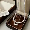 Collar de Cadena para Clavícula de Doble Capa con Perla Brillante de Lujo Ligero de Gama Alta, Temperamento Versátil Elegante Francés, Diseño de Nicho para Mujeres