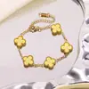 Acero de Titanio Chapado en Oro Transfronterizo Más Vendido Acero Inoxidable Pulsera, Collar, Anillo y Pendientes de Trébol de Cuatro Hojas Conjunto Fábrica al por Mayor