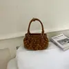 Bolso pequeño súper popular para mujer, nuevo modelo de verano 2026, bolso tipo cubo de hombro y cruzado de alta gama para el día a día