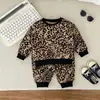 Ropa Infantil Transfronteriza Primavera y Otoño Nuevo Estilo Niños y Niñas Bebé Traje Infantil Sudadera Estampado de Leopardo Manga Larga Conjunto de Dos Piezas Moderno