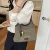 Bolsa Tecida Retro Francesa para Mulheres 2026 Nova Moda Versátil Bolsa de Ombro ou Axila Grande Capacidade Bolsa de Mão para o Dia a Dia