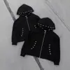 Nueva colección de otoño e invierno: Chamarra sudadera holgada y elegante con cremallera de anillo metálico y un diseño único perforado