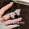 Pendientes de botón de plata de ley S999 con aguja de manta y perla rosa para mujer, estilo de lujo ligero, nuevos y populares 2026, joyería de oreja microincrustada