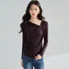 2026 Otoño Suave Sedoso Tencel Hombro Caído Asimétrico Cuello Redondo Manga Larga Camiseta Irregular Ajustado Ceñido Top de Punto 35048