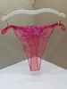 Tanga transparente sexy para mujer perspectiva entrepierna abierta hueco sexy bordado de flor de rosa a juego de colores transfronterizo