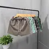 Shorts de pata de gallo para hombre de marca casual de lujo, nuevo estilo verano 2025, shorts de playa rectos holgados de cuatro puntos, pantalones casuales retro
