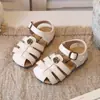 Sandalias Nuevas de Verano 2026 Estilo Coreano Moda Retro Camelia Calzado Cerrado para Niños Pequeños Sandalias Romanas para Bebé
