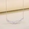 Collar de Plata Pura S999 Flor de Glicina Sonrisa para Mujer, Cadena de Clavícula de Lujo Ligero de Gama Alta, Colgante Simple de Moda Nicho Venta al por Mayor