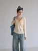 Cárdigan fino y holgado de color amarillo cremoso con botones y cuello en V para mujer, protección solar, top holgado y casual de manga larga para otoño-verano 2026