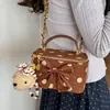 Essenciais para o Trajeto Super Quentes Bolsa Tote Pequena Feminina 2026 Nova Outono Camurça Corrente Ombro Único Transversal Bolsa Balde