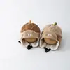 Gorro de orejeras de dibujos animados para niños de otoño e invierno con forma de nuez, gorro Lei Feng de dinosaurio para bebé, gorro a bloques de color a prueba de viento y cálido para niños y niñas