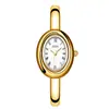 Reloj Pulsera GEDI Retro Ovalado Dorado para Mujer Números Romanos Esfera Incrustada con Diamantes Ligero Integrado Lujo de Nicho para Viajes Diarios Reloj de Cuarzo