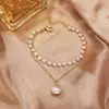 Colar minimalista de pérolas com camada dupla para mulheres, versátil e elegante, com um toque de moda de alta qualidade, corrente para clavícula de design único