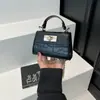 Bolso de Hombro Cruzado Versátil Simple Casual Moda Elegante Nuevo Temporada de Invierno 2026 Mini de Moda Bolso Cuadrado Pequeño