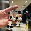 Llavero de cachorro lindo de dibujos animados, muñeco de plástico blando tridimensional, accesorio para mochila, llavero de coche, regalo pequeño, venta al por mayor