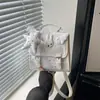 Mochila nueva, elegante y moderna, de estilo universitario nicho con diseño de estrellas, versátil como bolso de mano, bolso de hombro o cruzado de moda