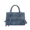 Bolsa de Mano Fresca Estilo Coreano al por Mayor Bolsa Cuadrada Pequeña Bolsa para Mujer 2026 Otoño Nueva Bolsa de Hombro de Color Sólido con Retazos Bolsa Cruzada para el Trabajo