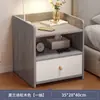 Mesa de noche simple moderna simple pequeña gabinete de almacenamiento para el hogar estante gabinete de almacenamiento dormitorio mini gabinete celebridad de internet