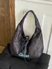 Bolso cruzado de estilo casual estampado para mujer, nuevo bolso de hombro de gran capacidad otoño 2026, bolso tote estudiantil moderno y versátil