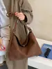 Bolso tejido de alta gama para mujer, nuevo modelo 2026, versátil bolso de hombro y cruzado, bolsa de mano tipo tote de gran capacidad para ir al trabajo, madre e hija
