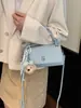 2026 Nuevo Estilo Bolso Pequeño Sencillo con Patrón de Lichi para Mujer, Bolso de Mano de Almohada de Gama Alta, Bolso de Hombro Cruzado Texturizado de Principios de Primavera