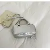Bolso de Mano Boston de Gama Alta 2026 Nuevo para Primavera/Verano Bolso Cruzado Casual Versátil Bolso de Bowling Dorado