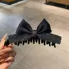 Nuevo estilo pinza de plátano vertical con lazo de pedrería para mujer, pinza para el pelo fácil de usar con un toque de alta gama, accesorio para el pelo de pinza de garra para recogido de coleta negra
